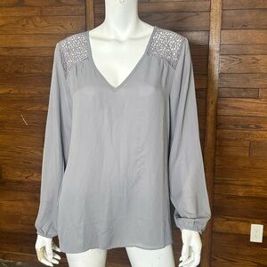 Rickis. Gray blouse, eyelet back detail pleated back size 12.